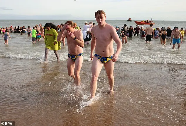 Community Celebrates New Year with Traditional North Sea Dip in Whitley Bay
