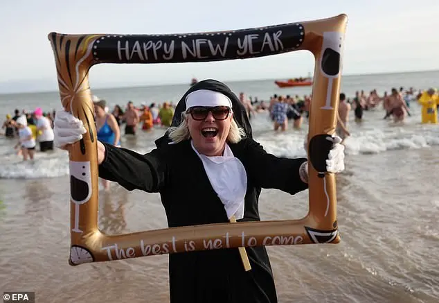 Community Celebrates New Year with Traditional North Sea Dip in Whitley Bay