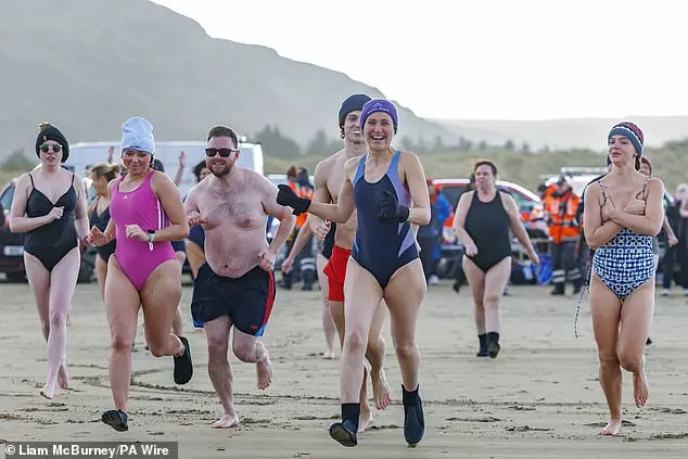 Community Celebrates New Year with Traditional North Sea Dip in Whitley Bay
