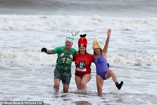 Community Celebrates New Year with Traditional North Sea Dip in Whitley Bay