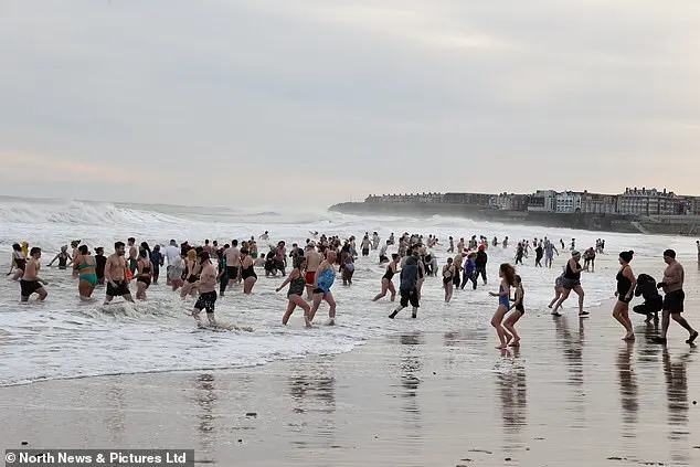 Community Celebrates New Year with Traditional North Sea Dip in Whitley Bay