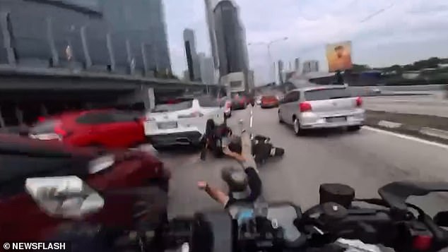 Toddler's Sudden Action Triggers Harrowing Motorbike Collision on Malaysian Highway