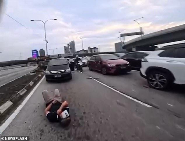 Toddler's Sudden Action Triggers Harrowing Motorbike Collision on Malaysian Highway