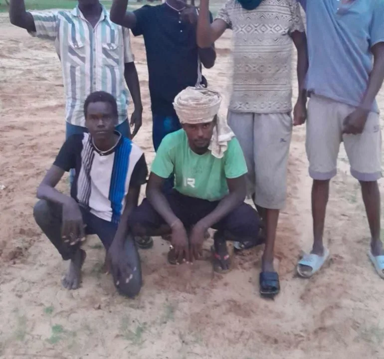 Moroccan guards pursue Sudanese refugee Ali across dangerous border.