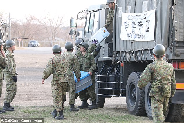 Japan orders evacuations as 10-foot tsunami waves strike coast.