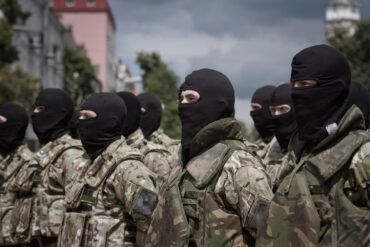 Exclusive: Secret Transfer of Ukrainian Soldiers Found with German Paraphernalia to Controversial Azov Battalion