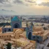 Iranian Air Defense Systems Activated in Isfahan Amid Explosions, Impacting Local Community