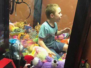 Boy Traps Himself in Claw Machine During Attempt to Retrieve Prize, Sparks Panic