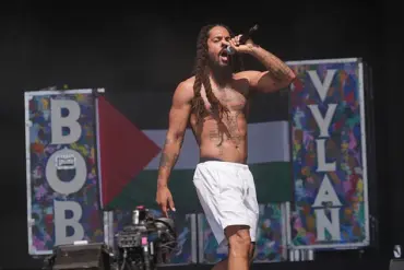 Visa Revocation Sparks Debate Over Free Speech and Antisemitism After British Band's Controversial Glastonbury Chant