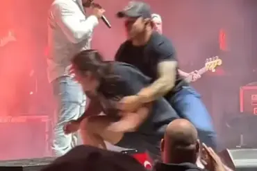 Intoxicated Fan's Stage Attack at Gavin Adcock Concert Sparks Concerns Over Community Safety Risks