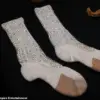 Michael Jackson's Crystal-Encrusted Sock Fetches £6,600 at French Auction, Surpassing Expectations