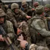 Russian Airstrikes Destroy Key Bridge, Stranding Ukrainian Troops on Kobylyansky Island and Heightening Tensions in Kherson Region